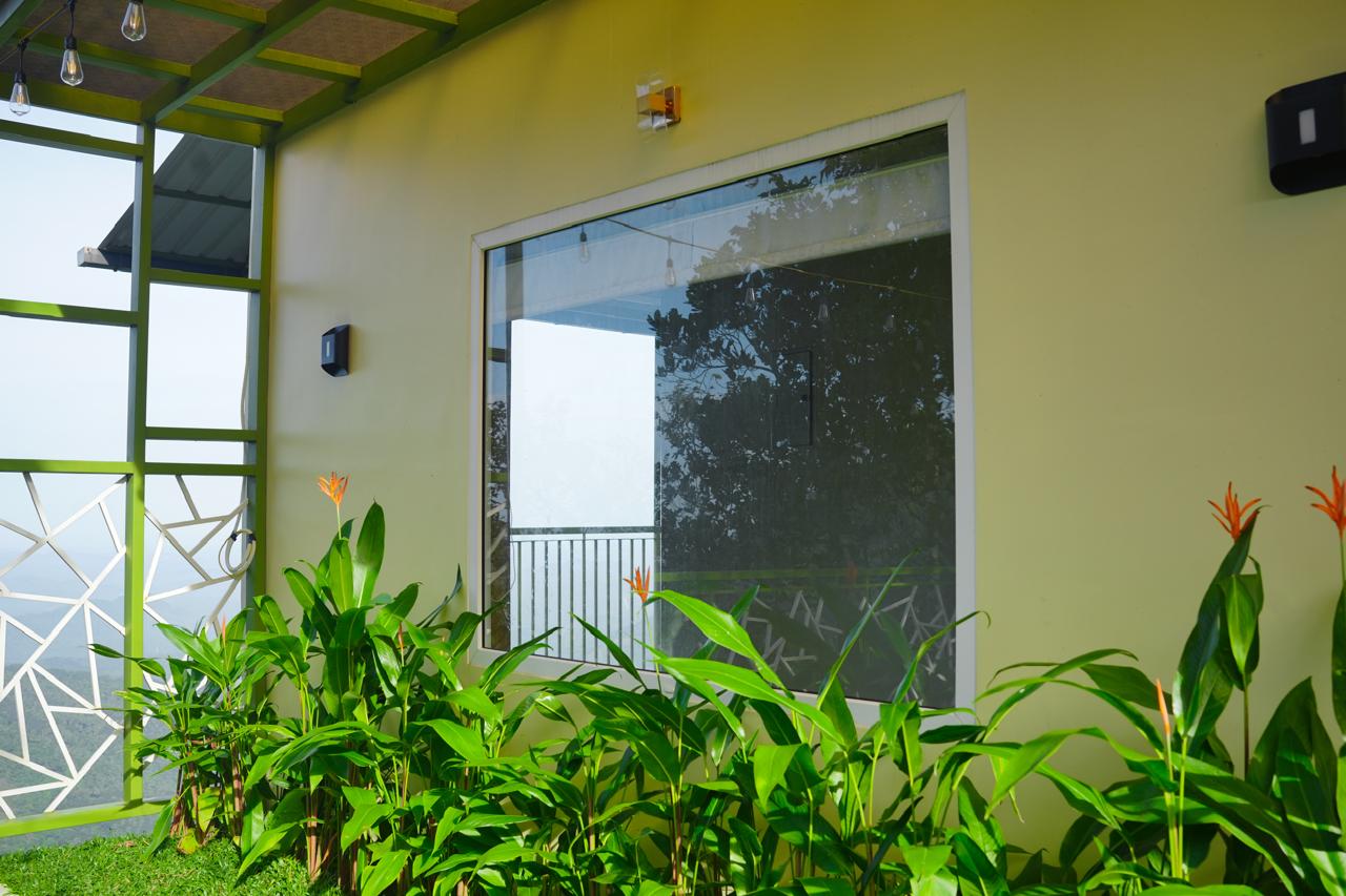 Resort exterior with lush greenery